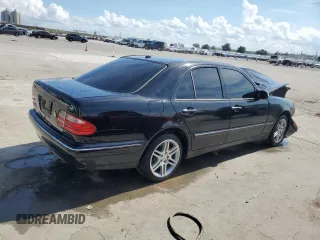2001 Mercedes-Benz E-Class AWD with VIN WDBJF82J21X056553, listed as a Copart auction lot 73046694 with 0 mi miles and Salvage Title. Bid and sale history available at carsss.com. Image 3.