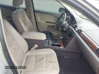 2009 Ford Taurus Limited z VIN 1FAHP25W89G113700, wystawiony jako IAAI lot #42365923 z przebiegiem 235 252 mil mil oraz . Historia ofert i sprzedaży dostępna na DreamBid. Obrazek 5.