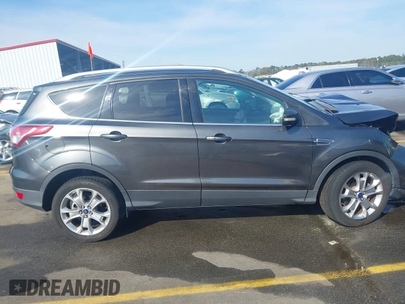 2015 Ford Escape Titanium with VIN 1FMCU0JX1FUB92412, listed as a IAAI auction lot 41893933 with 95,306 mi miles. Bid and sale history available at carsss.com. Image 12.