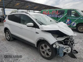 2014 Ford Escape SE z VIN 1FMCU9GX2EUC85787, wystawiony jako Copart lot #52739085 z przebiegiem 123 641 mil mil oraz Szkoda całkowita • Salvage title. Historia ofert i sprzedaży dostępna na DreamBid. Obrazek 4.