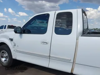 2003 Ford F-150 XL with VIN 1FTRX17L43NB82477, listed as a IAAI auction lot 42427957 with Not provided miles and . Bid and sale history available at DreamBid. Image 14.