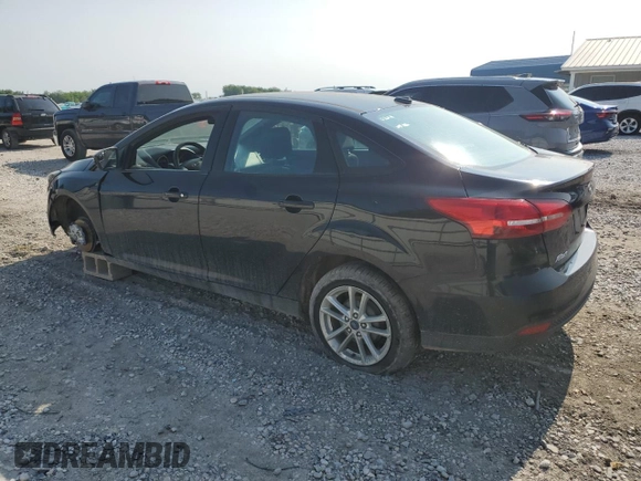 2016 Ford Focus SE with VIN 1FADP3F20GL361766, listed as a Copart auction lot 59258265 with 203,208 mi miles and Salvage title. Bid and sale history available at DreamBid. Image 2.