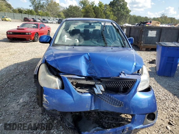2012 Suzuki SX4 LE with VIN JS2YC5A31C6303361, listed as a Copart auction lot 74329394 with 136,420 mi miles and Salvage Title. Bid and sale history available at carsss.com. Image 5.