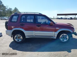 2000 Suzuki Grand Vitara with VIN JS3TE62V5Y4102944, listed as a IAAI auction lot 41782009 with 179,765 mi miles. Bid and sale history available at carsss.com. Image 14.