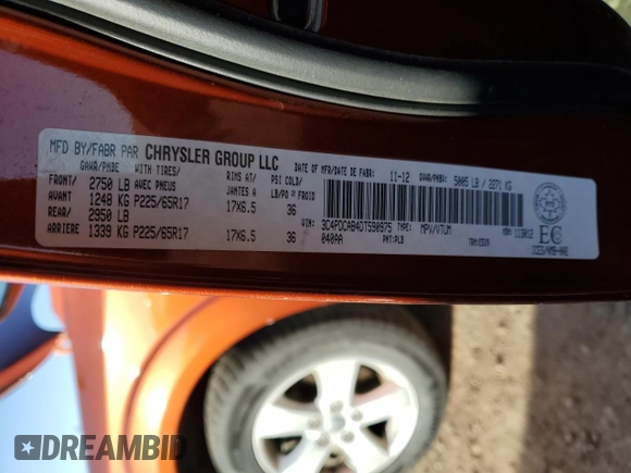 2013 Dodge Journey American Value with VIN 3C4PDCAB4DT590975, listed as a Copart auction lot 55627725 with 212,659 mi miles and Clean Title. Bid and sale history available at DreamBid. Image 14.