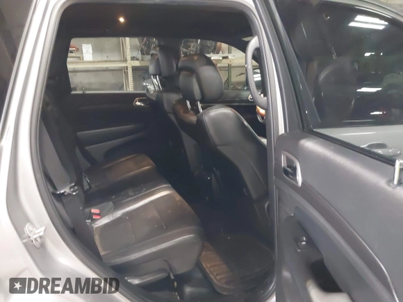2018 Jeep Grand Cherokee Laredo E with VIN 1C4RJFAG6JC102969, listed as a IAAI auction lot 41963137 with 112,361 mi miles and . Bid and sale history available at DreamBid. Image 8.