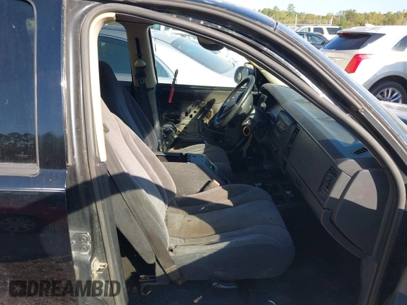 2003 Dodge Dakota SLT with VIN 1D7HL48X93S151422, listed as a IAAI auction lot 40661577 with 238,586 mi miles. Bid and sale history available at carsss.com. Image 5.