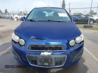 2013 Chevrolet Sonic LT with VIN 1G1JC6SB1D4171148, listed as a IAAI auction lot 41631280 with 147,874 mi miles. Bid and sale history available at carsss.com. Image 12.