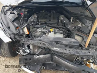 2015 Infiniti Q50 Premium with VIN JN1BV7AP7FM338434, listed as a IAAI auction lot 42158445 with 115,685 mi miles and . Bid and sale history available at DreamBid. Image 10.