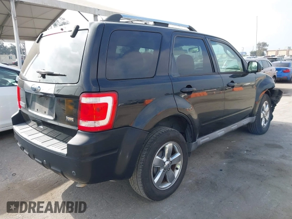 2010 Ford Escape Limited with VIN 1FMCU0EG9AKA03715, listed as a IAAI auction lot 42473990 with 207,234 mi miles and . Bid and sale history available at DreamBid. Image 4.