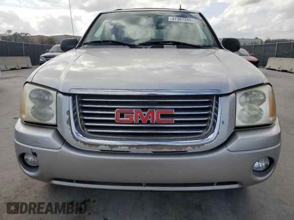 2006 GMC Envoy SLT with VIN 1GKDS13S662139632, listed as a Copart auction lot 47387245 with 246,803 mi miles and Salvage Title. Bid and sale history available at carsss.com. Image 5.
