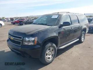 2013 Chevrolet Suburban LS with VIN 1GNSKHE71DR332335, listed as a IAAI auction lot 41408949 with 167,860 mi miles. Bid and sale history available at carsss.com. Image 2.