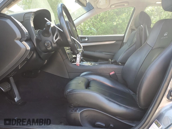 2013 Infiniti G37 Journey with VIN JN1CV6AP0DM717268, listed as a Copart auction lot 58037345 with 112,809 mi miles and Salvage title. Bid and sale history available at DreamBid. Image 7.
