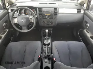 2009 Nissan Versa 1.8 S with VIN 3N1BC11E49L500200, listed as a Copart auction lot 87227464 with 215,170 mi miles and Salvage Title. Bid and sale history available at carsss.com. Image 8.
