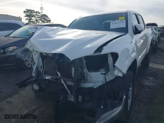2021 Toyota Tacoma 2WD SR with VIN 3TYAX5GNXMT014431, listed as a IAAI auction lot 41452734 with 64,254 mi miles. Bid and sale history available at carsss.com. Image 6.