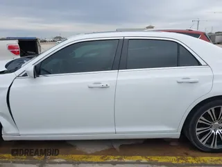 2013 Chrysler 300 with VIN 2C3CCABGXDH735739, listed as a IAAI auction lot 41282492 with 121,487 mi miles. Bid and sale history available at carsss.com. Image 15.