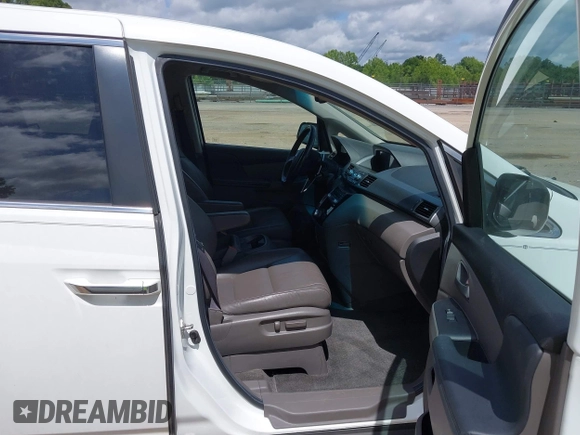 2012 Honda Odyssey EX-L with VIN 5FNRL5H62CB019238, listed as a IAAI auction lot 42524694 with 271,384 mi miles and . Bid and sale history available at DreamBid. Image 5.