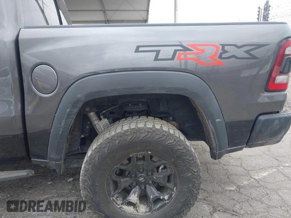 2022 Ram 1500 TRX with VIN 1C6SRFU98NN334983, listed as a IAAI auction lot 42010145 with 19,207 mi miles and . Bid and sale history available at DreamBid. Image 6.
