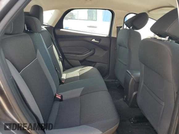 2014 Ford Focus SE z VIN 1FADP3K21EL424134, wystawiony jako Copart lot #56692545 z przebiegiem 46 342 mil mil oraz Szkoda całkowita • Salvage title. Historia ofert i sprzedaży dostępna na DreamBid. Obrazek 10.