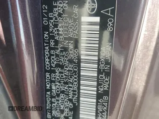 2012 Scion iQ z VIN JTNJJXB00CJ014966, wystawiony jako Copart lot #83100954 z przebiegiem 100 775 mil mil oraz Szkoda całkowita • Salvage title. Historia ofert i sprzedaży dostępna na DreamBid. Obrazek 14.