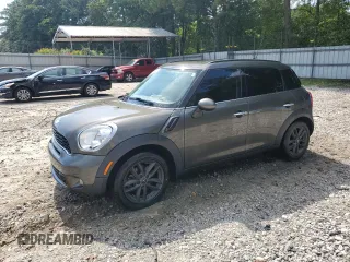 2014 MINI Countryman S z VIN WMWZC3C57EWP25099, wystawiony jako Copart lot #62646555 z przebiegiem 153 059 mil mil oraz Szkoda całkowita • Salvage title. Historia ofert i sprzedaży dostępna na DreamBid. Obrazek 1.