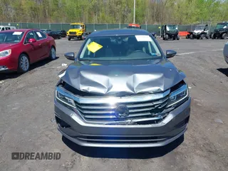 2021 Volkswagen Passat SE with VIN 1VWSA7A39MC011507, listed as a IAAI auction lot 42160879 with 82,639 mi miles and . Bid and sale history available at DreamBid. Image 12.