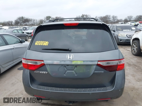 2012 Honda Odyssey Touring with VIN 5FNRL5H96CB138548, listed as a IAAI auction lot 41471856 with 186,284 mi miles and . Bid and sale history available at DreamBid. Image 17.