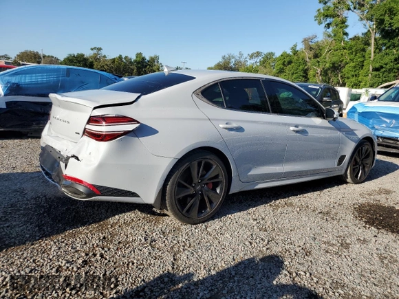 2023 Genesis G70 3.3T with VIN KMTG54TE3PU113251, listed as a Copart auction lot 52675895 with 20,969 mi miles and Salvage title. Bid and sale history available at DreamBid. Image 3.