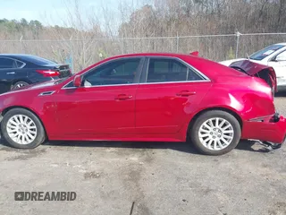 2012 Cadillac CTS Luxury with VIN 1G6DE5E54C0113154, listed as a IAAI auction lot 41467669 with 150,759 mi miles and . Bid and sale history available at DreamBid. Image 14.