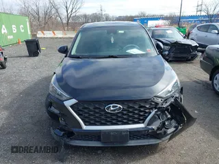 2019 Hyundai Tucson SE with VIN KM8J2CA46KU977863, listed as a IAAI auction lot 41704318 with 23,076 mi miles. Bid and sale history available at carsss.com. Image 12.