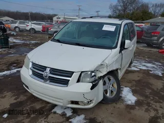 2010 Dodge Grand Caravan SXT with VIN 2D4RN5D18AR218903, listed as a IAAI auction lot 41560484 with Not Provided miles and . Bid and sale history available at DreamBid. Image 2.
