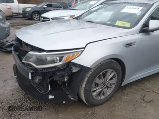 2016 Kia Optima LX Turbo with VIN 5XXGT4L1XGG006432, listed as a IAAI auction lot 41620038 with 137,210 mi miles. Bid and sale history available at carsss.com. Image 19.