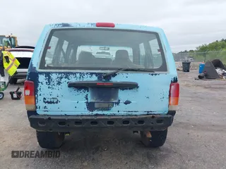 1997 Jeep Cherokee SE z VIN 1J4FJ28S3VL573144, wystawiony jako IAAI lot #41965201 z przebiegiem 298 276 mil mil oraz . Historia ofert i sprzedaży dostępna na DreamBid. Obrazek 16.
