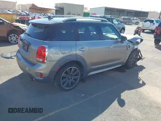 2019 MINI Countryman Cooper S with VIN WMZYT3C58K3E97323, listed as a IAAI auction lot 41490191 with 48,966 mi miles and . Bid and sale history available at DreamBid. Image 4.