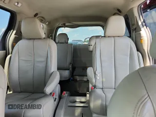 2012 Toyota Sienna XLE AAS с VIN 5TDYK3DC9CS242080, выставлен на аукционе Copart как лот 58374845 с пробегом 152 411 миль миль и Списание • Salvage title. История ставок и продаж доступна на DreamBid. Изображение 10.