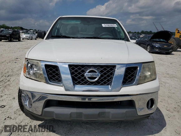 2009 Nissan Frontier SE with VIN 1N6AD07U19C411546, listed as a Copart auction lot 57683625 with 216,492 mi miles and Salvage title. Bid and sale history available at DreamBid. Image 5.
