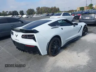 2014 Chevrolet Corvette 1LT z VIN 1G1YB2D72E5123317, wystawiony jako IAAI lot #42403964 z przebiegiem 36 113 mil mil oraz . Historia ofert i sprzedaży dostępna na DreamBid. Obrazek 4.