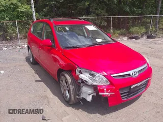 2010 Hyundai Elantra Touring SE with VIN KMHDC8AE2AU075841, listed as a IAAI auction lot 40128211 with 173,541 mi miles. Bid and sale history available at carsss.com. Image 1.