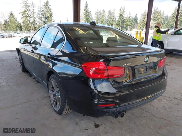 2018 BMW 3 Series 330i xDrive with VIN WBA8D9G56JNU70886, listed as a IAAI auction lot 41752477 with 35,960 mi miles. Bid and sale history available at carsss.com. Image 3.