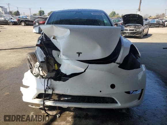2022 Tesla Model Y Performance with VIN 7SAYGDEF8NF381644, listed as a Copart auction lot 44554585 with 71,413 mi miles and Salvage Title. Bid and sale history available at DreamBid. Image 5.