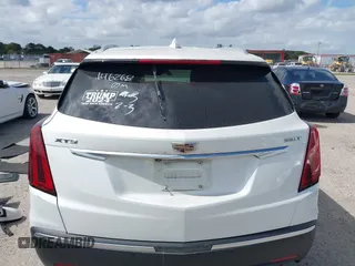 2021 Cadillac XT5 FWD Luxury with VIN 1GYKNAR40MZ146268, listed as a IAAI auction lot 41522802 with 61,775 mi miles. Bid and sale history available at carsss.com. Image 17.