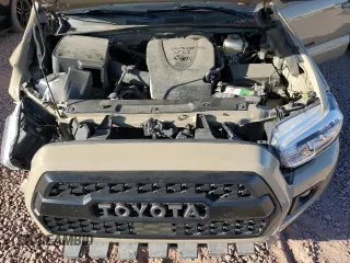 2019 Toyota Tacoma SR z VIN 5TFCZ5AN8KX171793, wystawiony jako Copart lot #57907015 z przebiegiem 96 925 mil mil oraz Szkoda całkowita • Salvage title. Historia ofert i sprzedaży dostępna na DreamBid. Obrazek 11.
