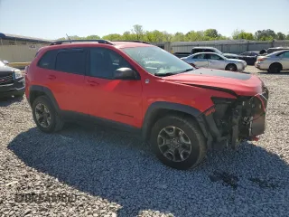 2019 Jeep Cherokee Trailhawk with VIN 1C4PJMBX2KD147090, listed as a Copart auction lot 52435815 with 101,043 mi miles and Salvage Title. Bid and sale history available at DreamBid. Image 4.