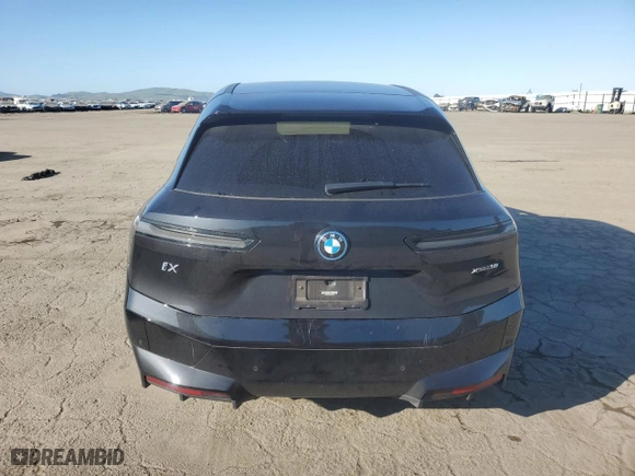 2022 BMW iX xDrive50 with VIN WB523CF00NCK62949, listed as a Copart auction lot 47047805 with 25,035 mi miles and Salvage Title. Bid and sale history available at carsss.com. Image 6.