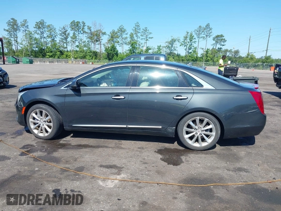 2014 Cadillac XTS Luxury z VIN 2G61M5S37E9211547, wystawiony jako IAAI lot #42373128 z przebiegiem 146 354 mil mil oraz . Historia ofert i sprzedaży dostępna na DreamBid. Obrazek 14.