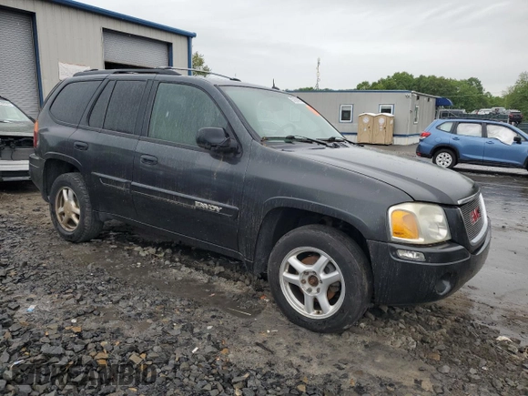 2005 GMC Envoy SLT with VIN 1GKDT13S452324077, listed as a Copart auction lot 57836195 with 299,146 mi miles and Clean title. Bid and sale history available at DreamBid. Image 4.