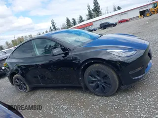 2024 Tesla Model Y with VIN 7SAYGDED3RF119101, listed as a IAAI auction lot 42019817 with 35,714 mi miles and . Bid and sale history available at DreamBid. Image 13.