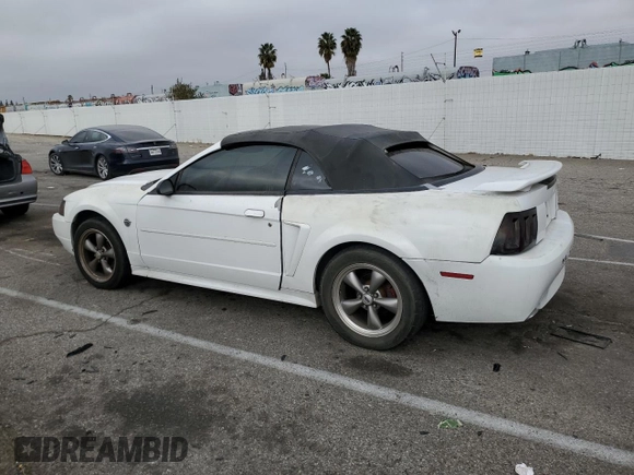 2004 Ford Mustang Deluxe z VIN 1FAFP44454F123067, wystawiony jako Copart lot #86784474 z przebiegiem 161 541 mil mil oraz Szkoda całkowita • Salvage title. Historia ofert i sprzedaży dostępna na DreamBid. Obrazek 2.