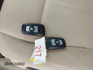 2015 BMW 3 Series 320i xDrive with VIN WBA3C3C55FP664465, listed as a IAAI auction lot 41608096 with 67,911 mi miles and . Bid and sale history available at DreamBid. Image 11.