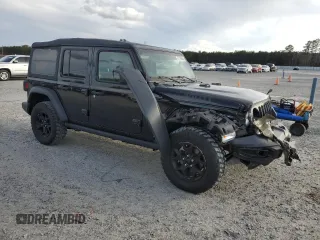 2023 Jeep Wrangler Sport with VIN 1C4HJXDG2PW546208, listed as a Copart auction lot 47779635 with 40,491 mi miles and Salvage Title. Bid and sale history available at DreamBid. Image 4.